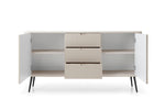 White ribbed sideboard with open doors showing interior shelves and drawer unit