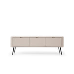 Mila TV cabinet with cream-white fluted doors, two drawers, and tapered dark legs.