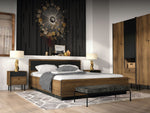 Tall double wardrobe with oak-effect sides, black ribbed doors, and lower drawers
