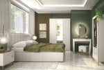 White bedside table with single door and gold-tone handle