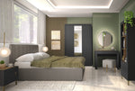 Black bedside table with single door and gold-tone handle