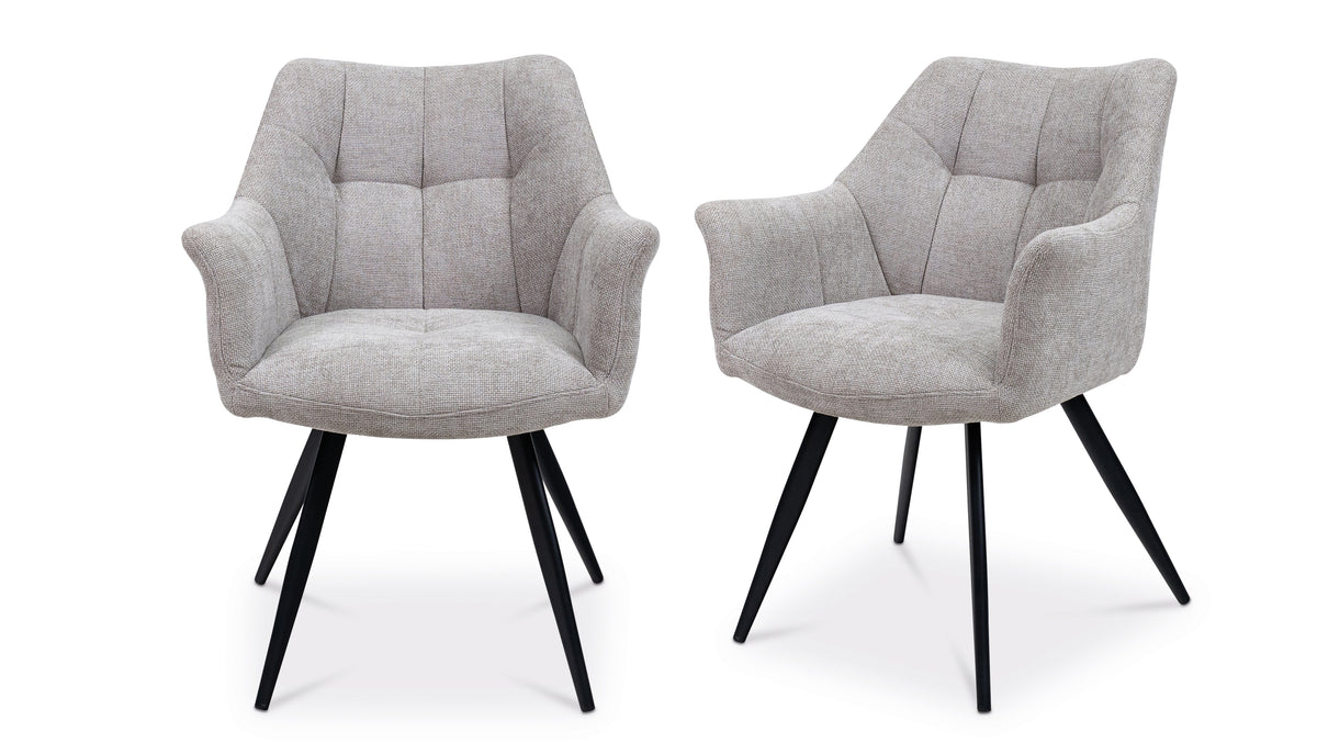 Pair of grey fabric dining chairs with tufted backs, armrests, and black legs