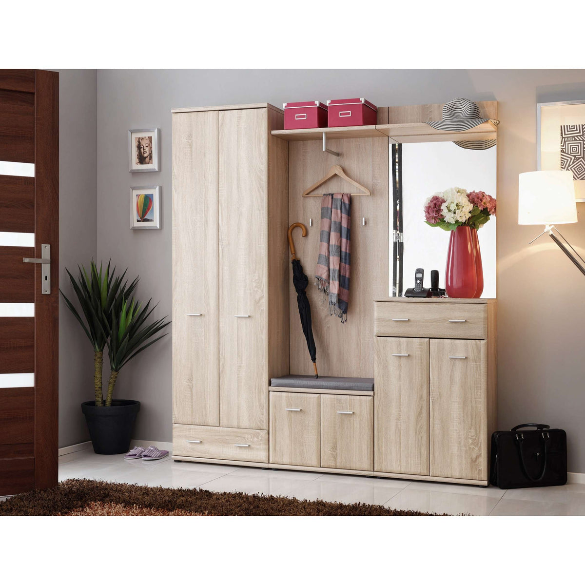 Hallway wardrobe with light oak effect finish, double doors and lower drawers.